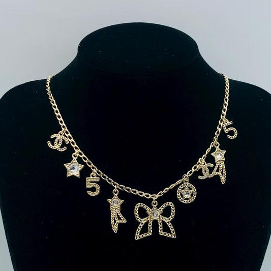 Elegant Gold Chain Necklace with Iconic Motif Pendants