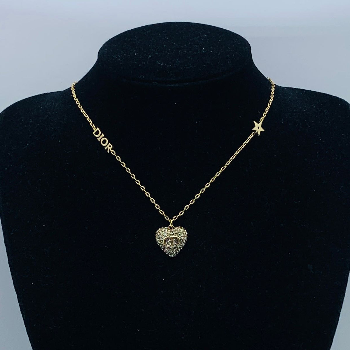 Classy Gold Heart Pendant Necklace with Crystal Detailing and Star Charm
